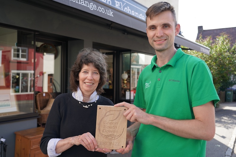 The Green South Downs sustainability plaque being presented at The Pulborough Exchange